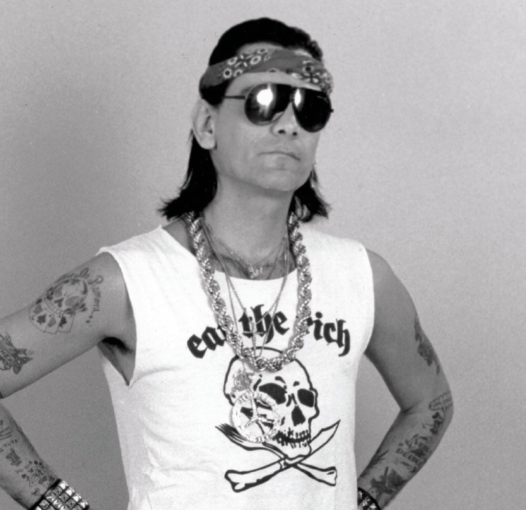 Dee Dee Ramone wearing an eat the Rich t-shirt